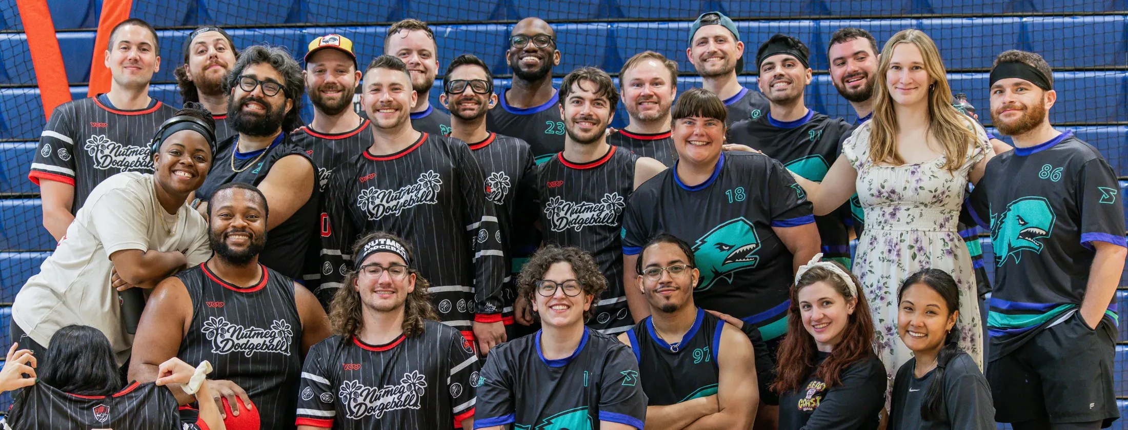 The full Connecticut Dodgeball league posing together on the court